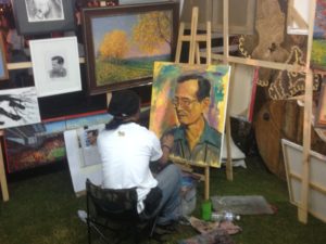 Singha Park - Artist busy painting the late King