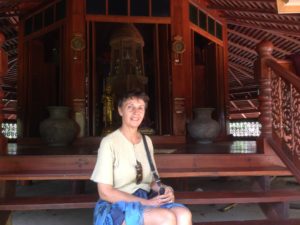 Bamboo walkway over rice fields - Buddhist Temple