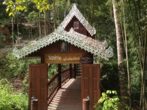 Bamboo walkway over rice fields - Buddhist Temple