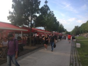 Lyon - The River Rhone boat restaurants spilling onto the promenade