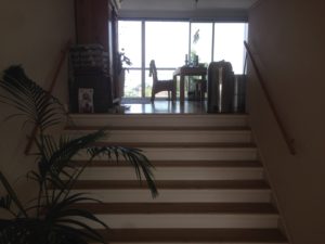 Stairs going up the kitchen and dining area